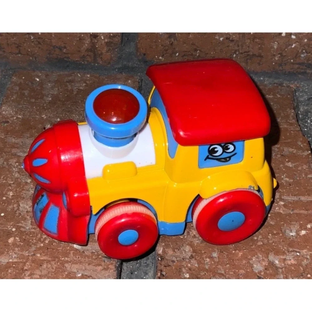 Red Yellow Blue Plastic Toy Train Engine with Cartoon Face Rolling Wheels 3